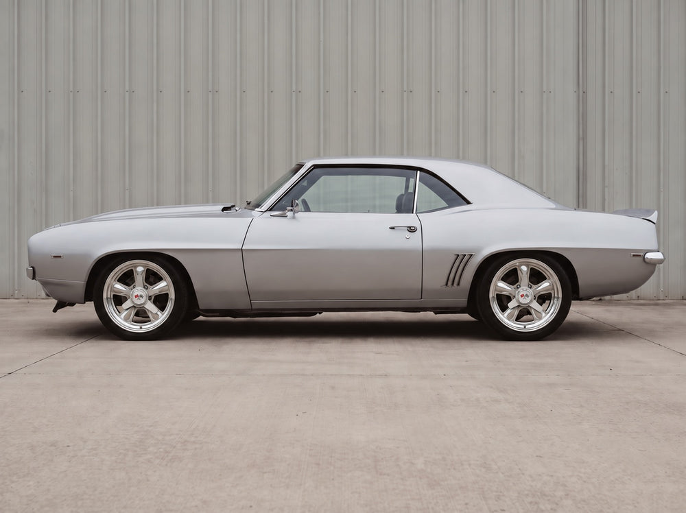 Camaro, outside the shop with Heritage 5 wheels