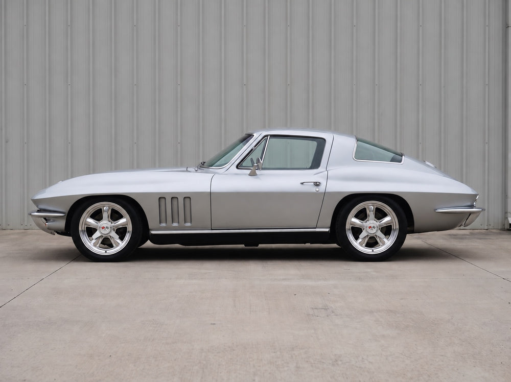 Corvette, outside the shop with Heritage 5 wheels