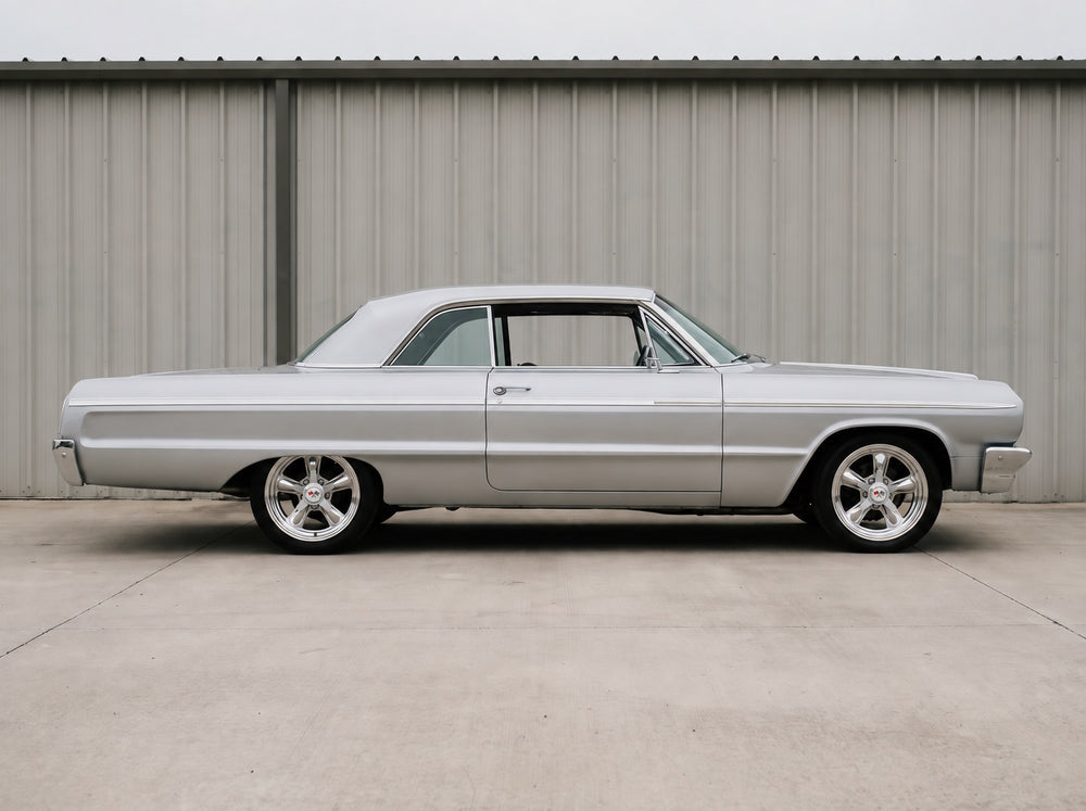 Impala, outside the shop with Heritage 5 wheels