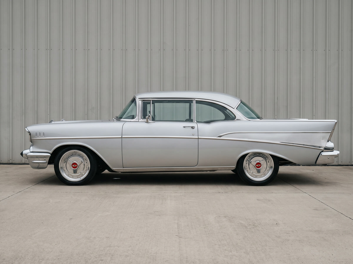 1957 Bel Air, outside the shop with 57 Hubcap Wheel wheels