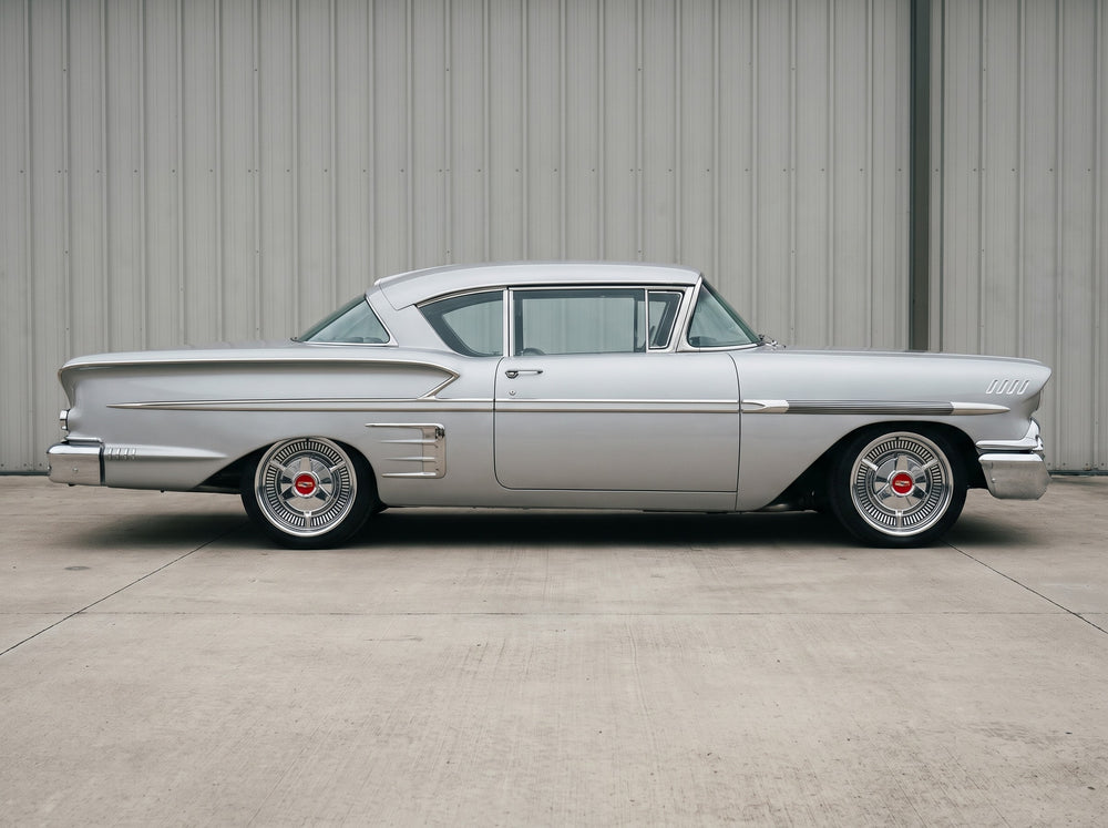 1958 Impala, outside the shop with 58 Hubcap Wheel wheels