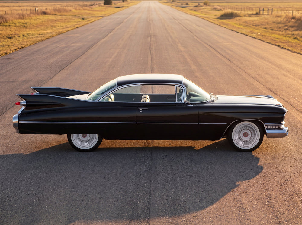1959 Coupe de Ville, on the open road with 59 Cadillac wheels
