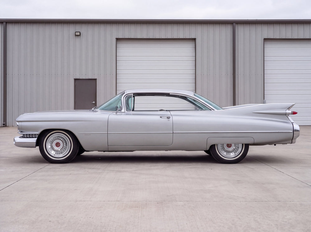 1959 Coupe de Ville, outside the shop with 59 Cadillac wheels